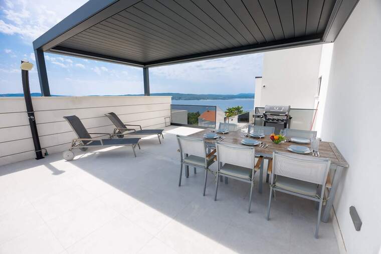 Pool terrace: dining under the pergola, gas BBQ, sea view