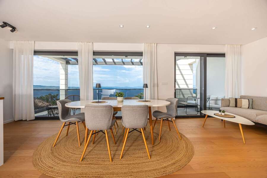 Dining table for six by the terrace doors