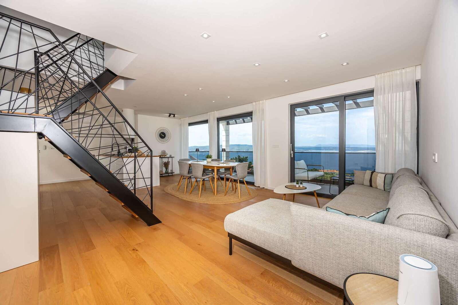 Living room with staircase to the upper floor