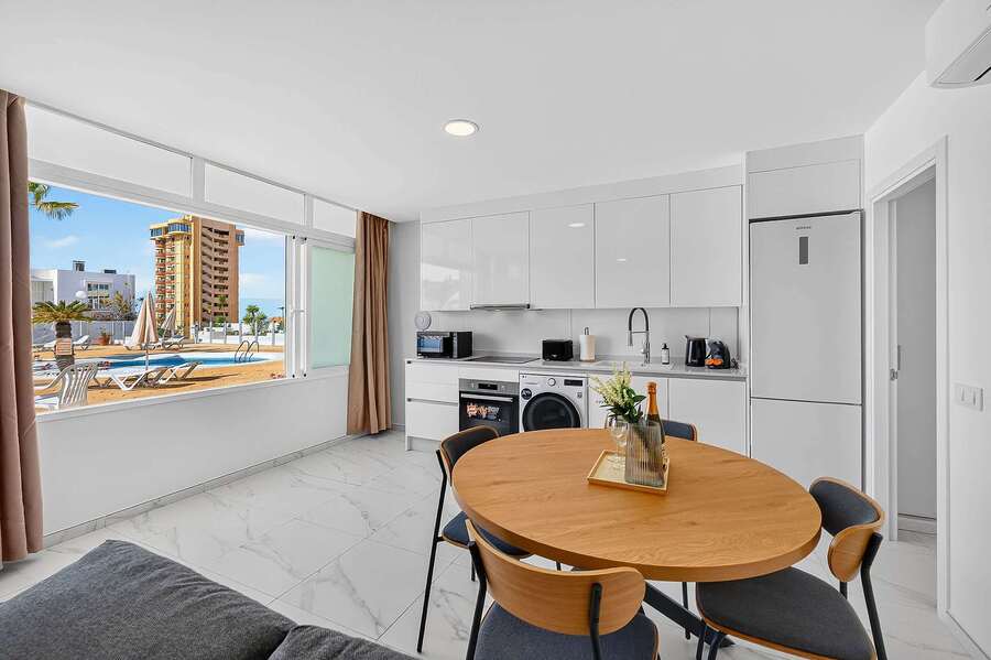 Kitchen & Dining with Pool View