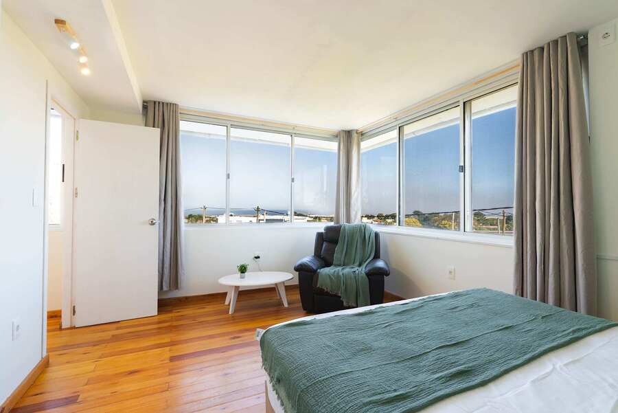 Bedroom with Panoramic Corner Windows