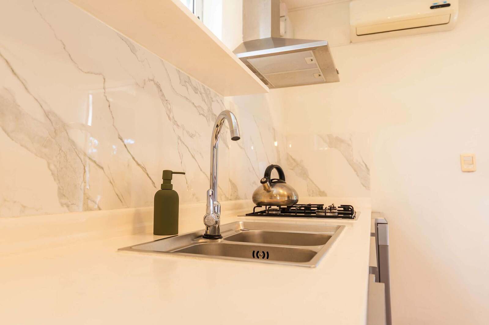 Kitchen Counter with Marble Backsplash