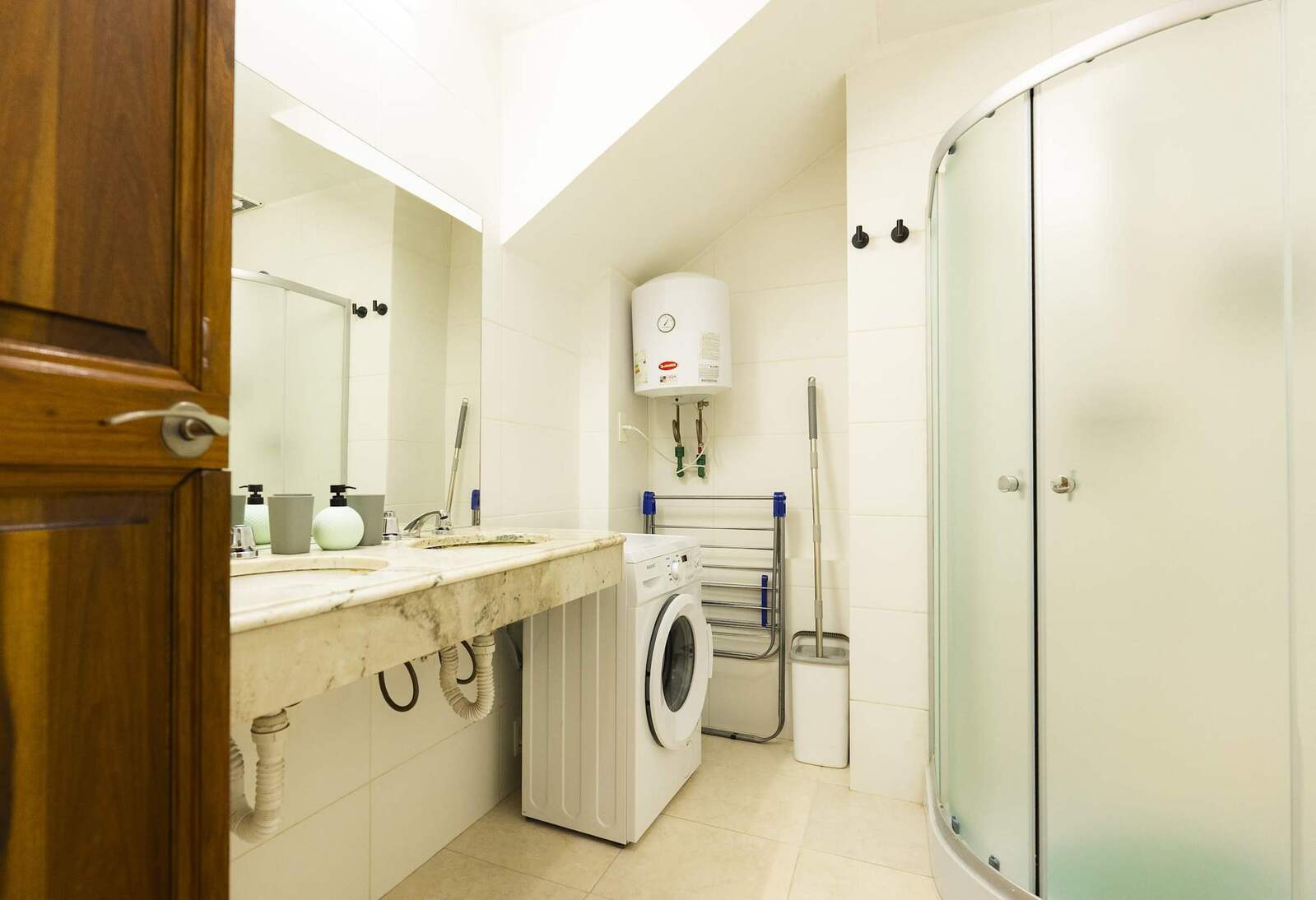 Bathroom with Marble Vanity and Washer