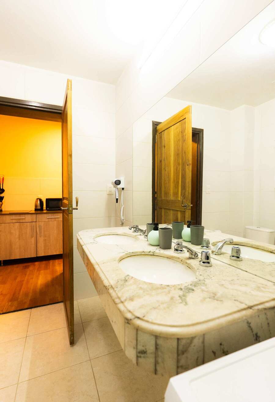 Bathroom with Twin Marble Basins