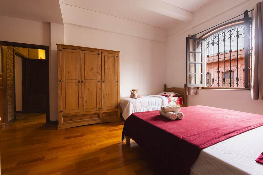 Living Room with Wardrobe and Single Bed