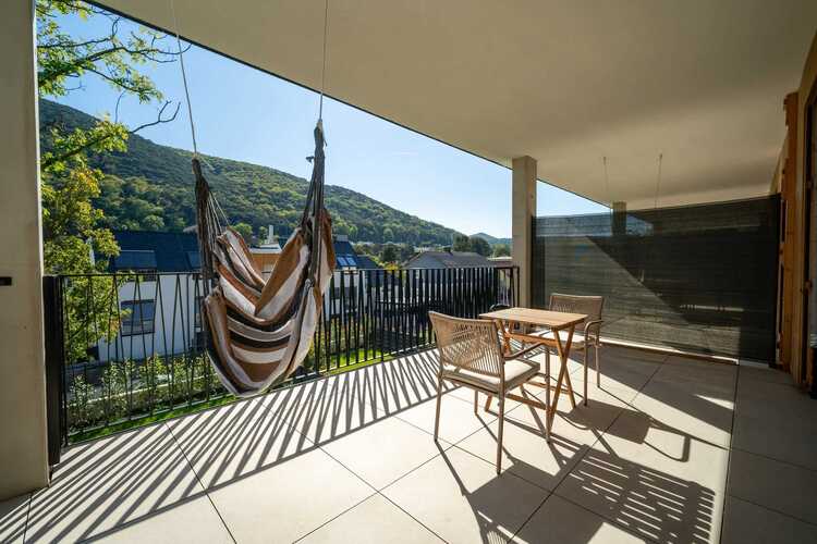 Balcony with hanging chair