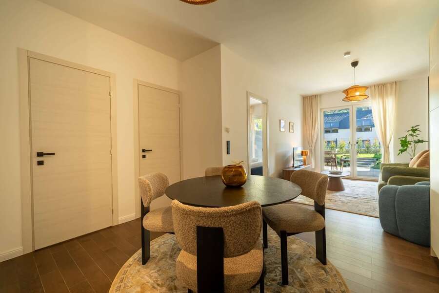 Dining area with doors to the terrace
