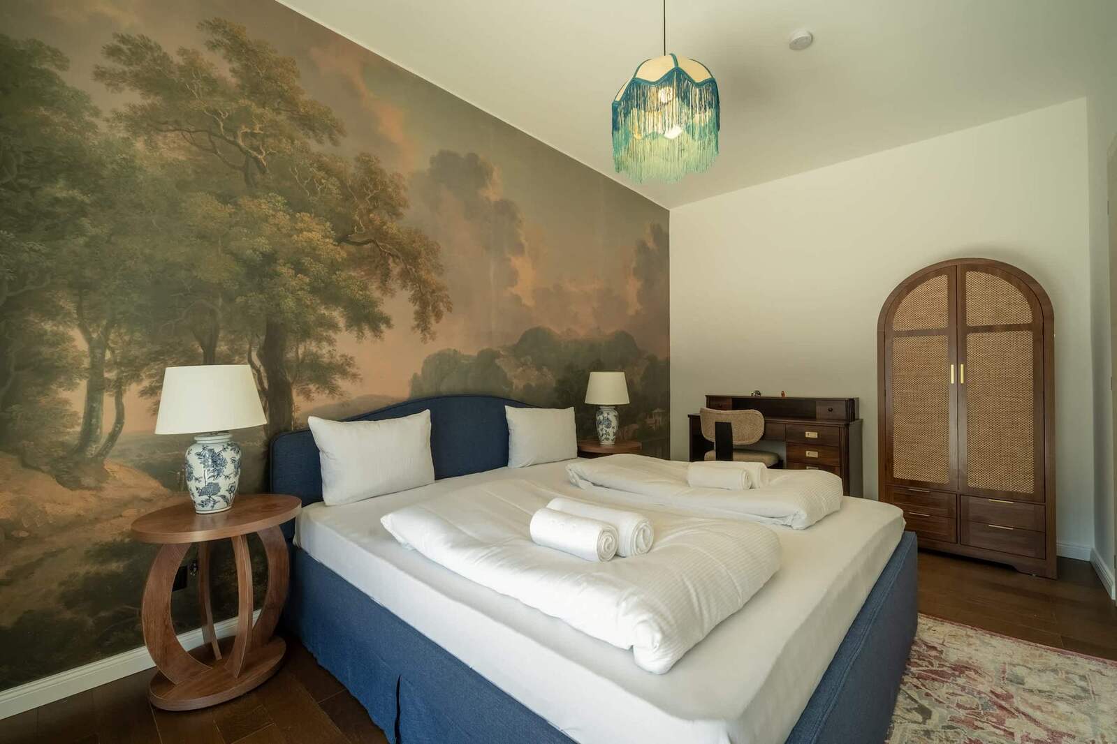 Bedroom with landscape mural