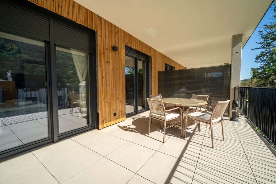 Balcony with outdoor dining