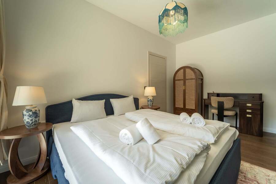 Bedroom with wardrobe and desk
