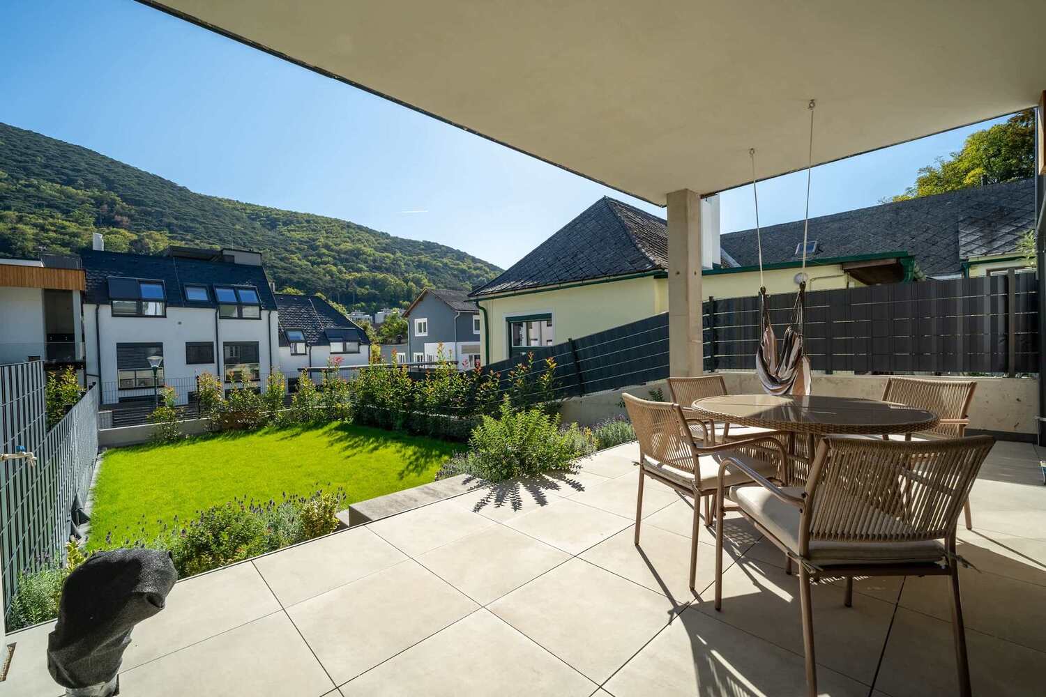 Terrace and garden with views of the wooded hills
