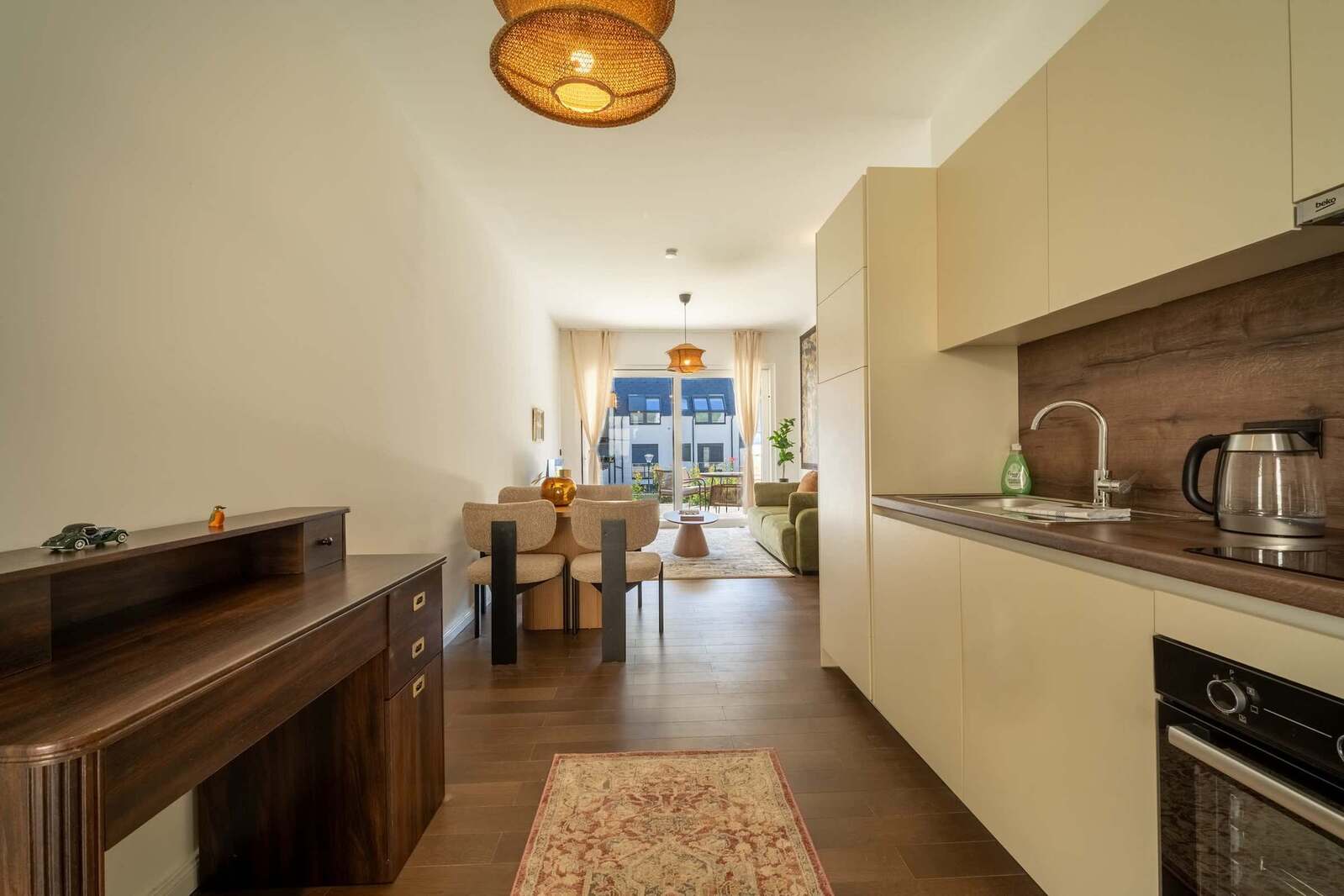 Kitchen, writing desk and dining area